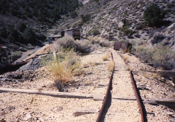 see the ore carts on the right side of the tracks?